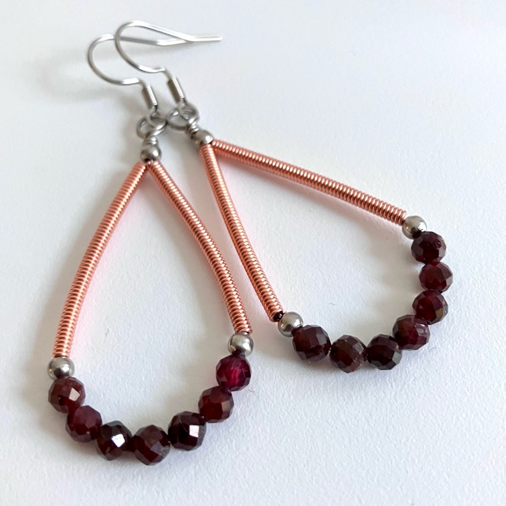 Chic artisan mixed metal coiled wire teardrop hoop earrings with natural garnet